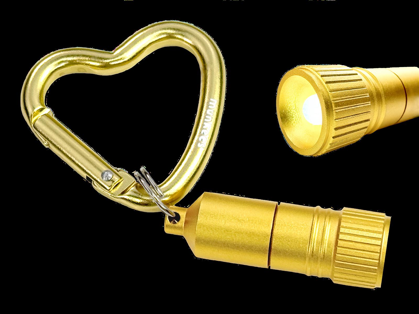 Detailansicht des goldenen Herz-Karabiners Verschlussmechanismus