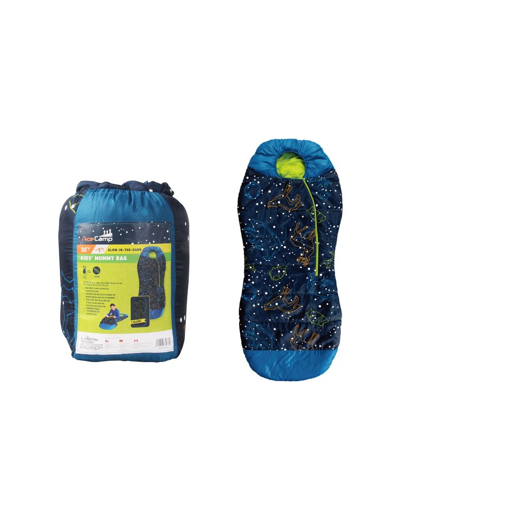 AceCamp Kinderschlafsack leuchtend – Kind liegt gemütlich eingeschlafen darin