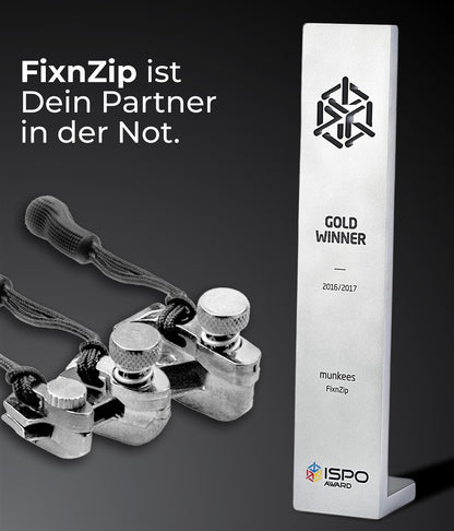 Munkees Fixnzip Reparatur Set Inhalt alle Teile ausgebreitet auf weißem Hintergrund
