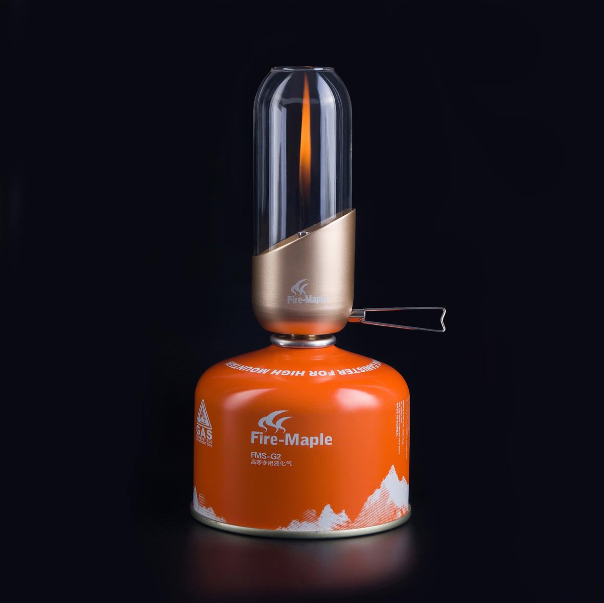 Ersatzglas Fire-Maple Orange Gaslaterne neben Originalverpackung auf weißem Hintergrund