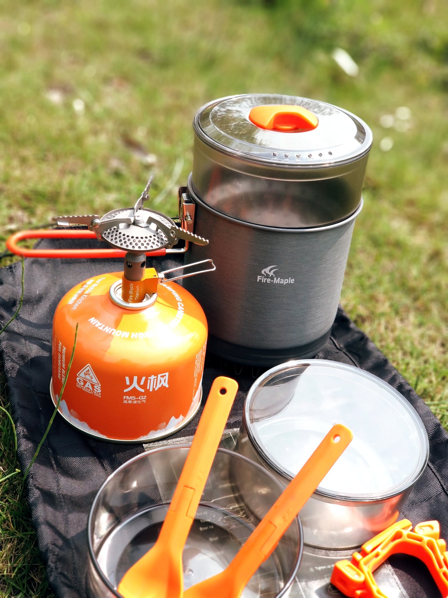 Fire Maple Island Campingkocher in geöffneter Transportverpackung Draufsicht