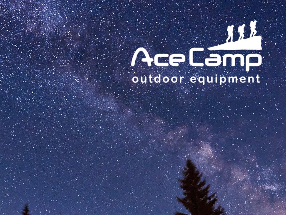 AceCamp Faltbare Klappsäge beim Sägen eines Astes im Wald